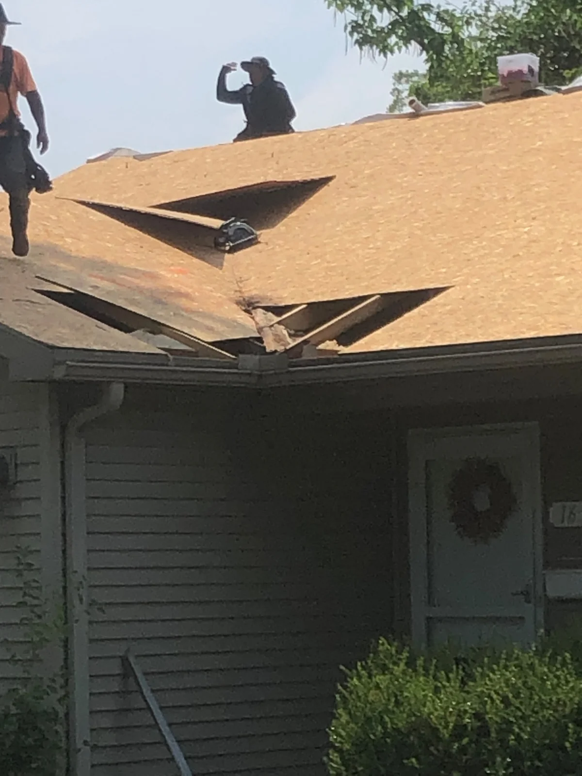 Exposed roof decking during a residential roof replacement
